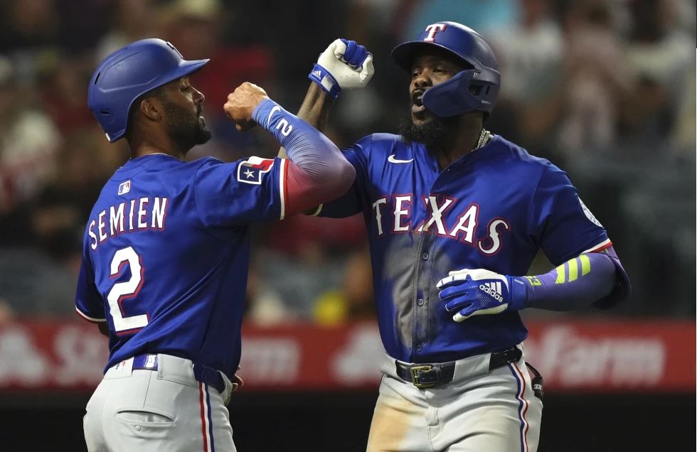 Marcus Semien bateó de 5-4, Corey Seager