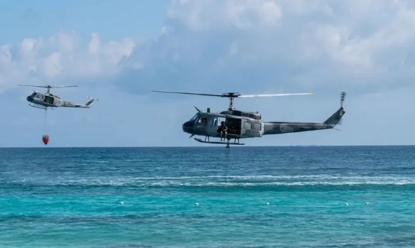Despliegan helicópteros para apoyar extinción de incendio en hotel de Bayahíbe